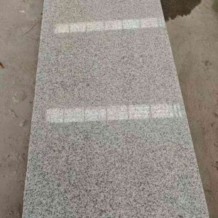 漳州芝麻白光面毛板